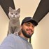 Ahmad + stapan de animal de companie care a apelat la un pet sitter in loc de pensiune canina sau pet hotel
